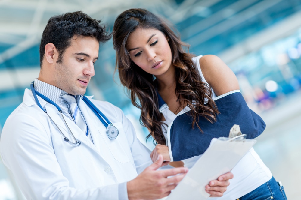 Injured Woman speaking to the doctor