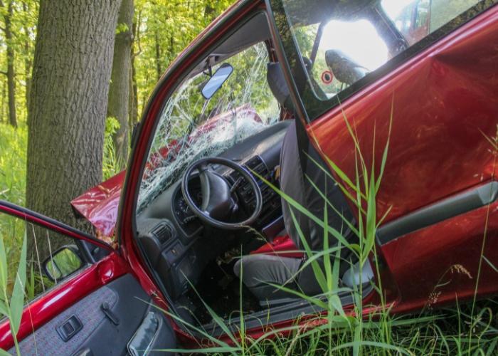 Driver injured in Highway 64 crash after car strikes driveway, goes airborne and rolls over, Local News