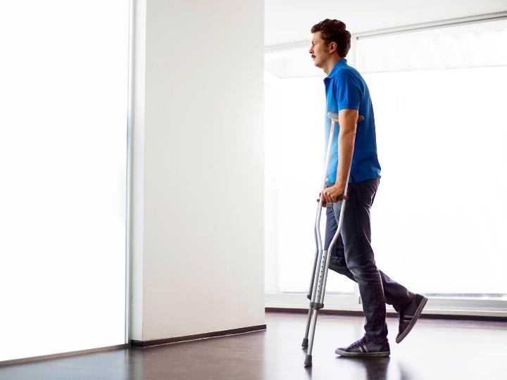 man-injured-ankle-at-work-and-needs-crutches